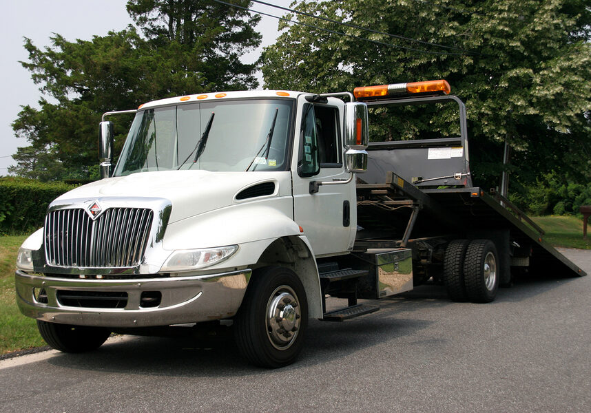 towing truck beside the road