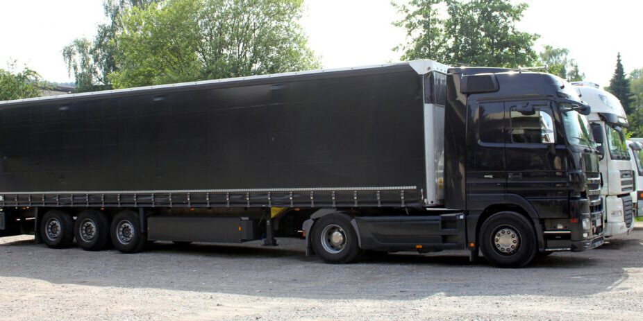 trailer trucks in the parking lot